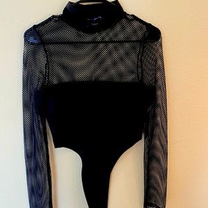 Turtle neck , fishnet bodysuit